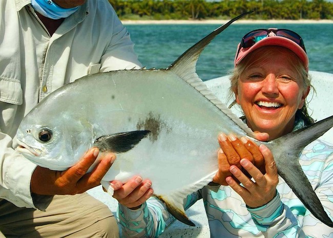 Funny Margaret in Boca Paila with her tour guide and family fishing.
