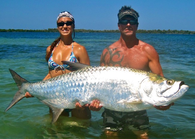 Amelia and Jake proud of their fishing near Playa del Carmen.
